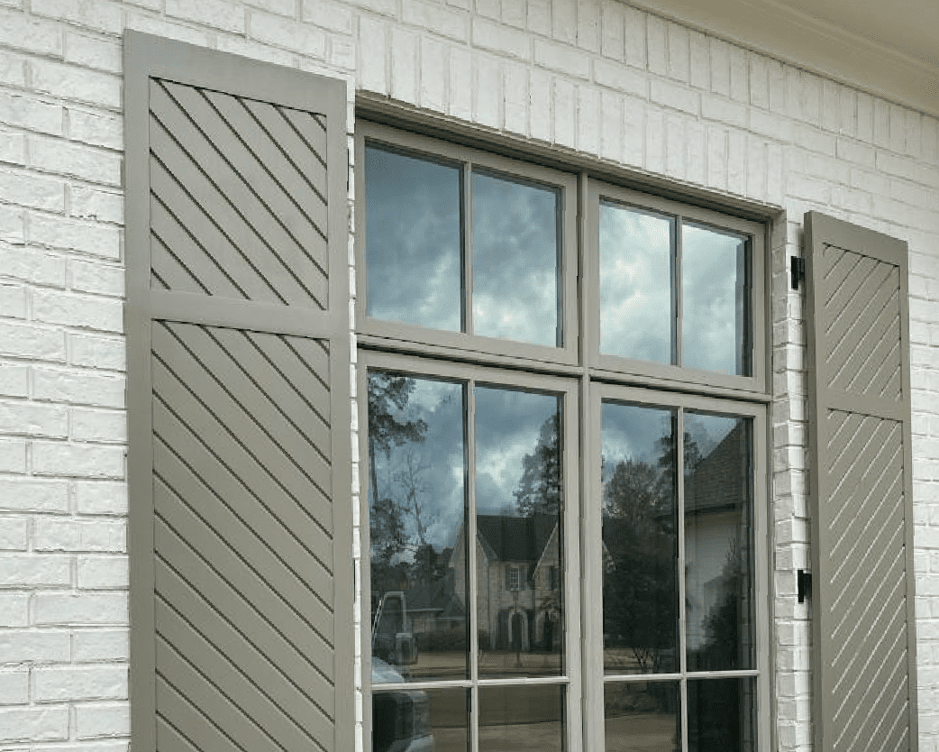 Paneled shutters built by Dwell Shutter & Blinds